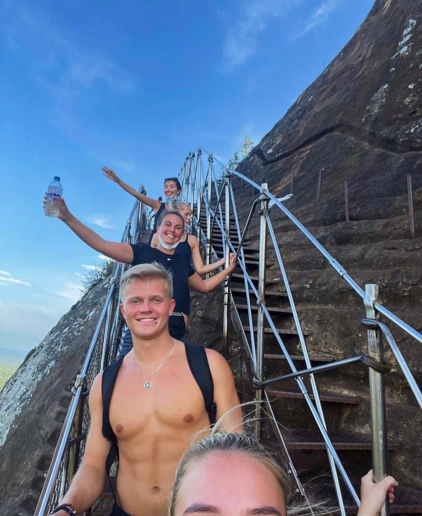 On the staircase pinned to the rock face